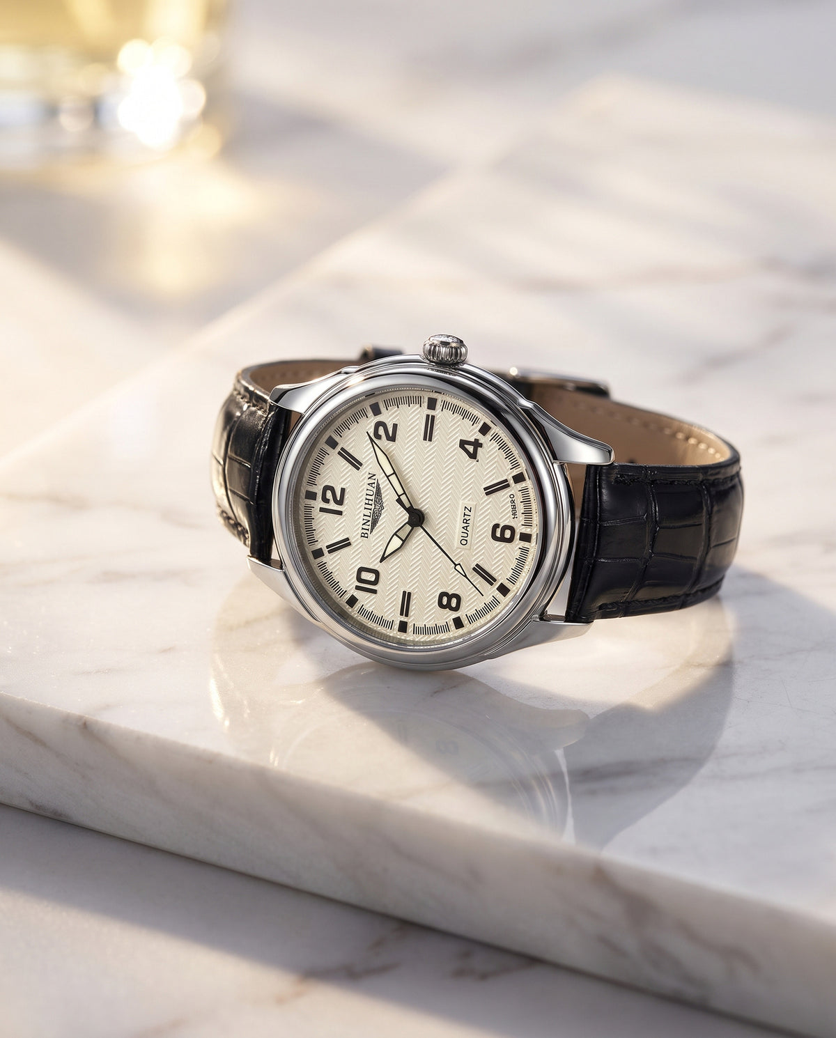 AWC textured cream-dial quartz watch displayed on white marble