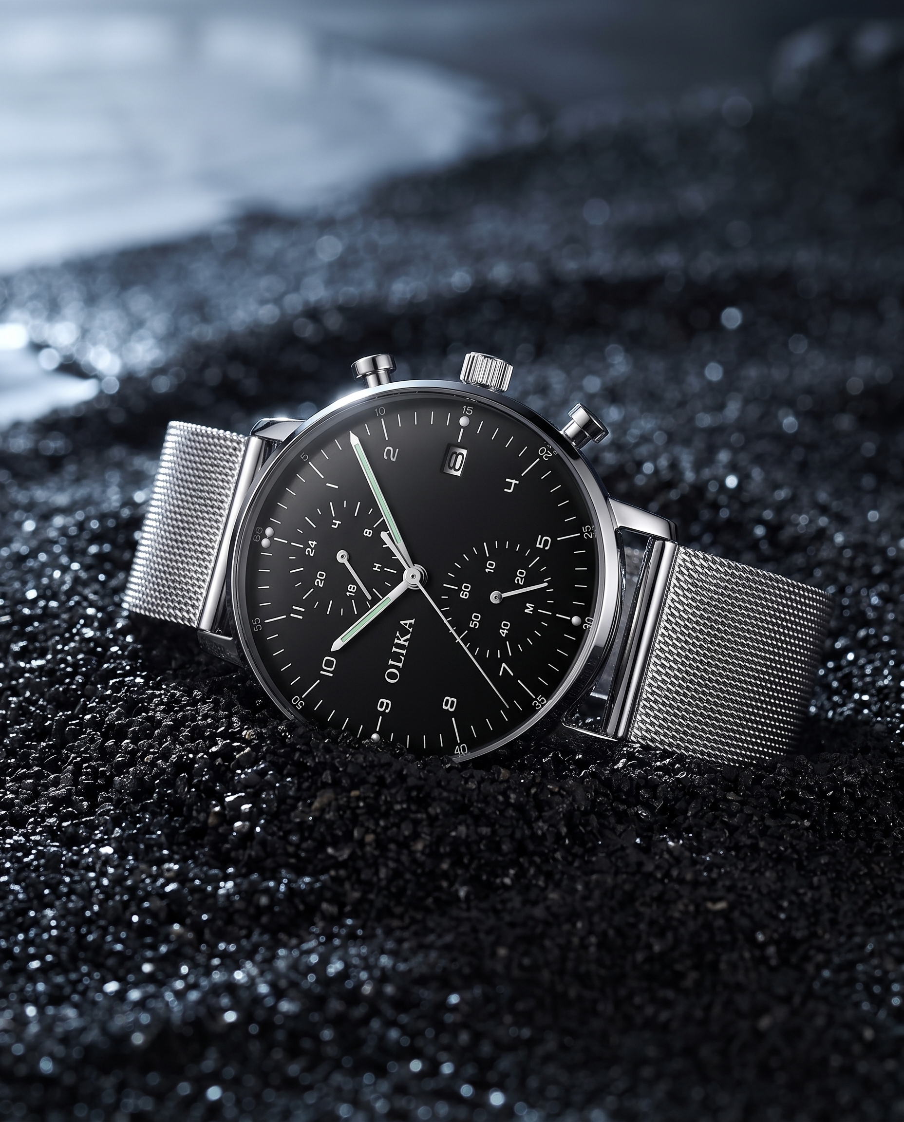 OLIKA chronograph on black sand