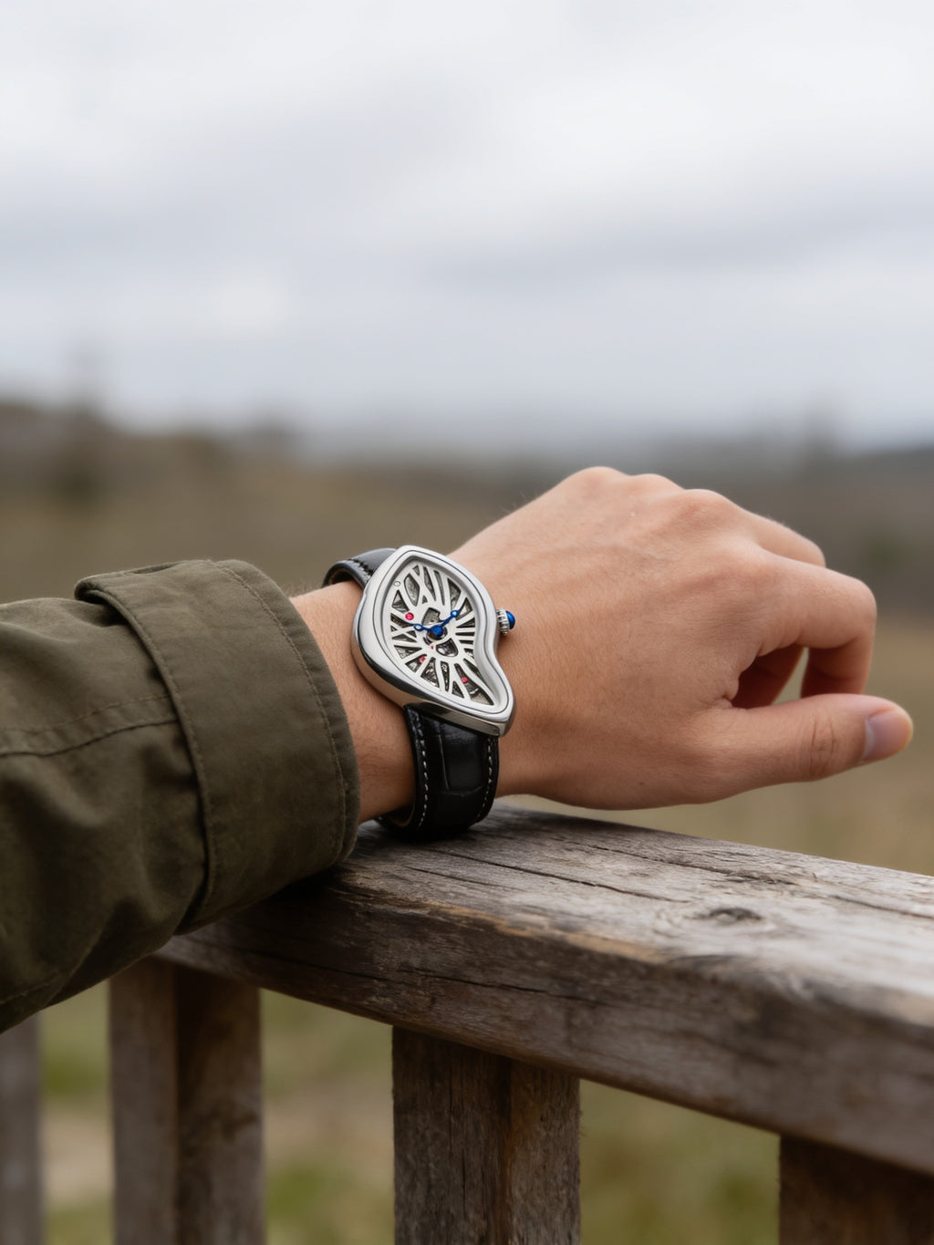 Eston Crash Melted Y2K watch in Silver Skeleton worn outdoors (X03C)