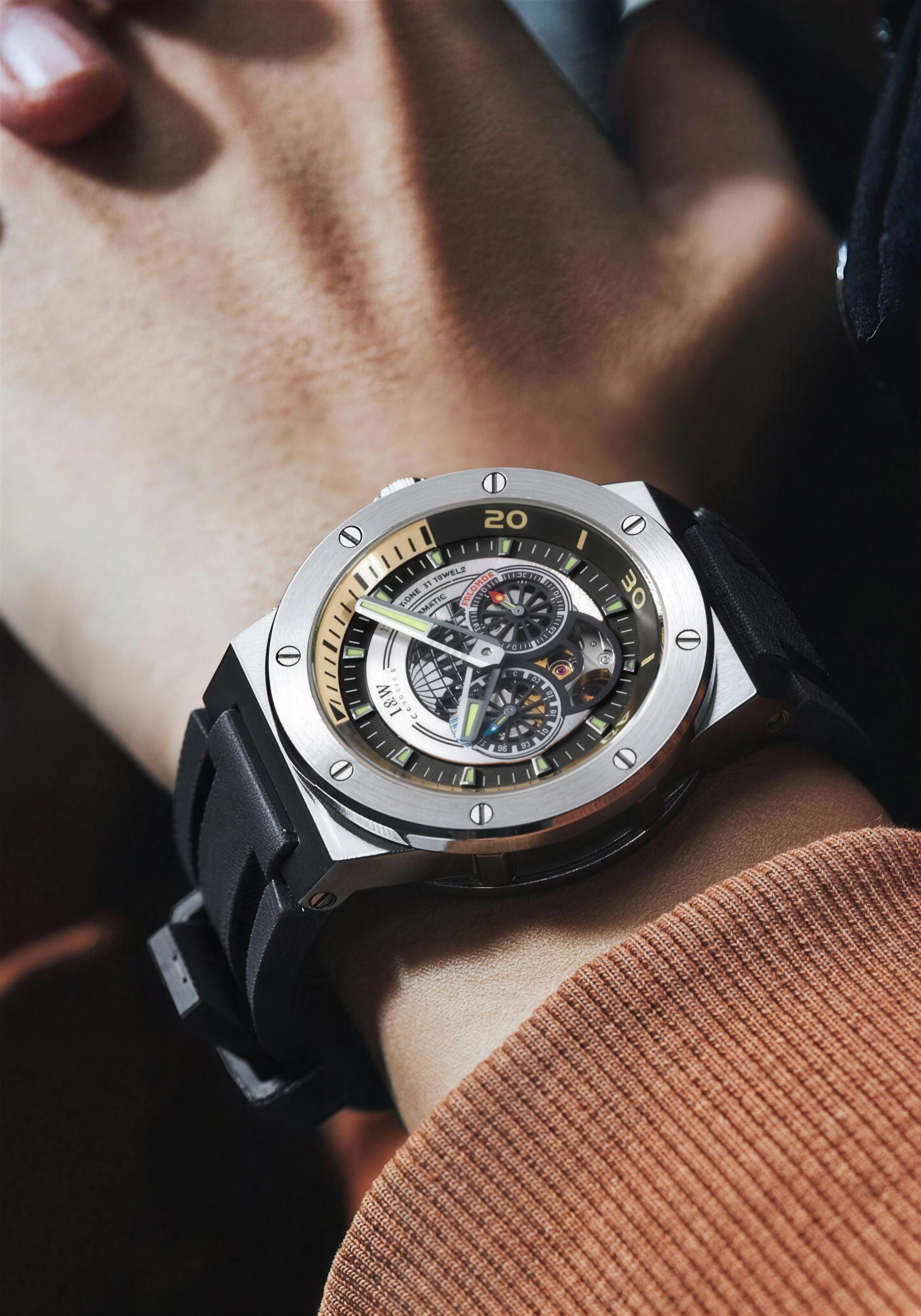 Carnival IW.619G worn on the wrist with knit sleeve, 4K