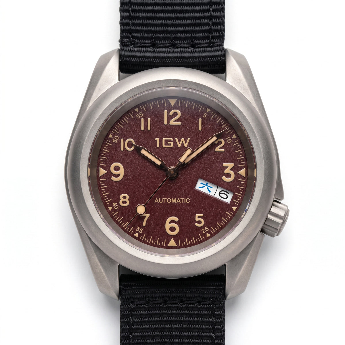1GW Burgundy Field Day-Date Titanium 40mm - straight-on studio hero on white, burgundy textured dial, cream numerals, day-date at 3