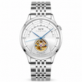 Carnival I&W IW.525G open-heart automatic watch, white dial, Roman numerals, 24-hour ring, gold open-heart aperture and stainless-steel bracelet on white