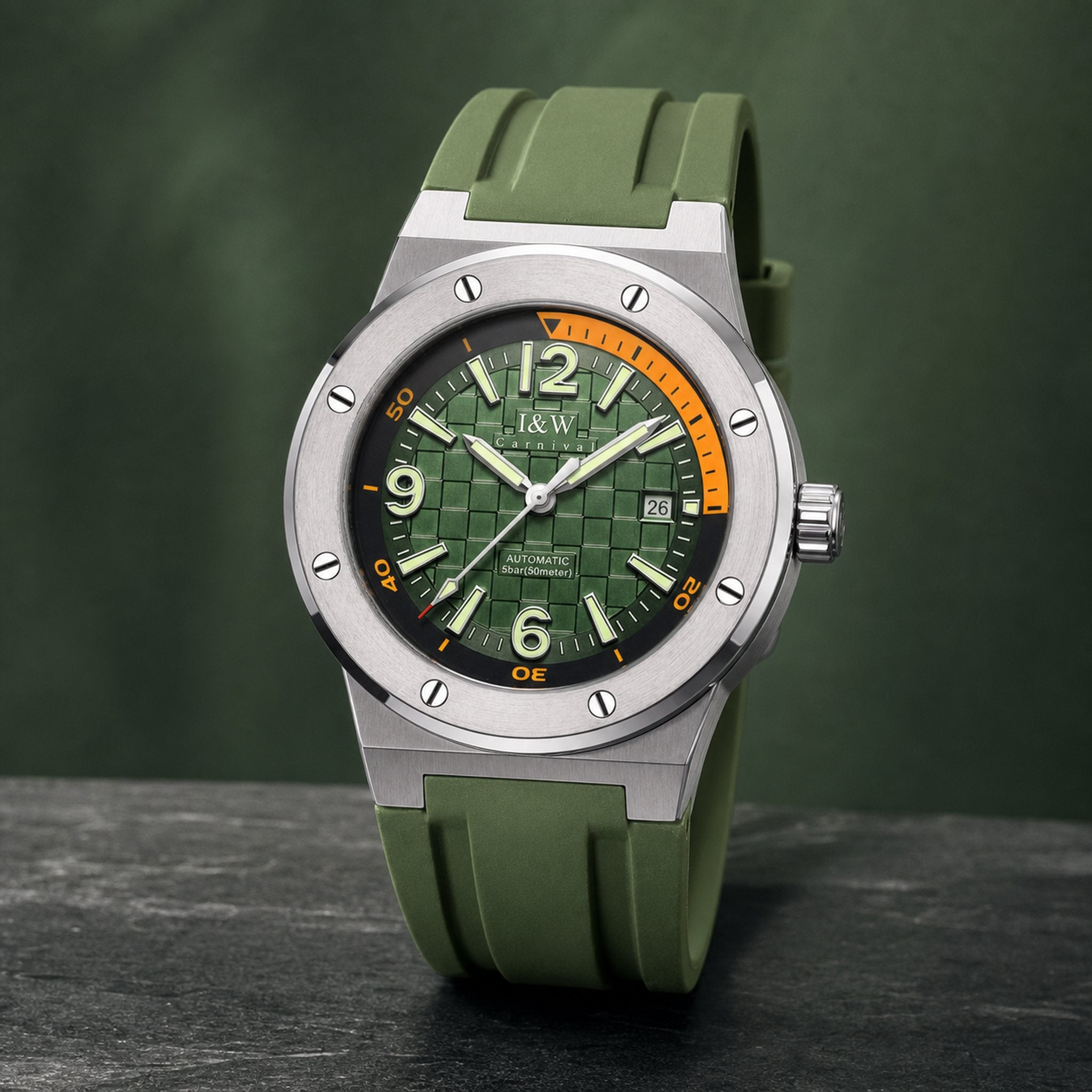 Carnival I&W IW.618G green-dial automatic watch with green silicone strap on dark stone