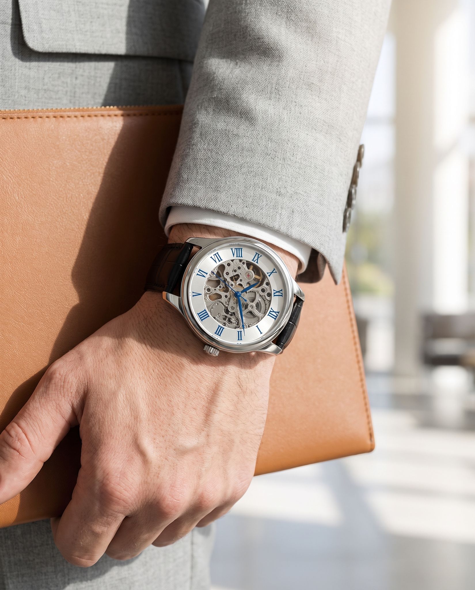 Carnival IW.652G worn on the wrist carrying a leather portfolio