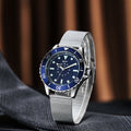TPW diver-style quartz watch with blue dial and silver mesh bracelet