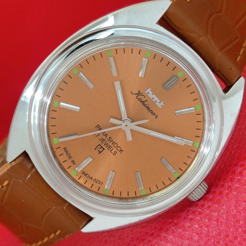 Vintage HMT Kohinoor orange dial watch with tan strap