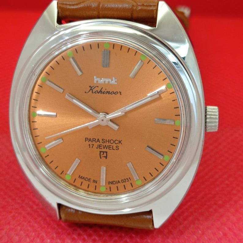 Vintage HMT Kohinoor orange dial close view