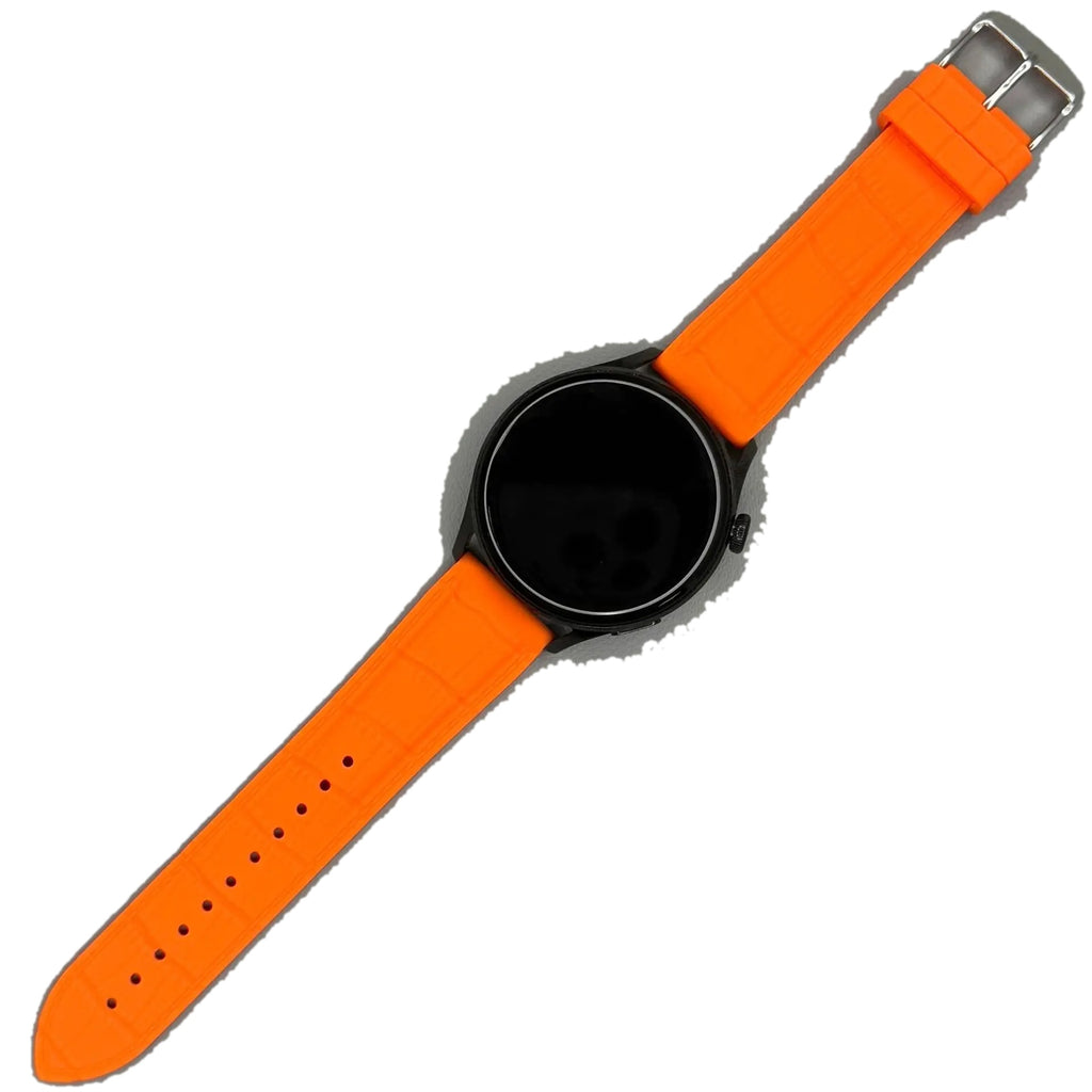 1GW Orange leather-texture silicone watch strap laid flat on white, showing buckle and rounded tail tip