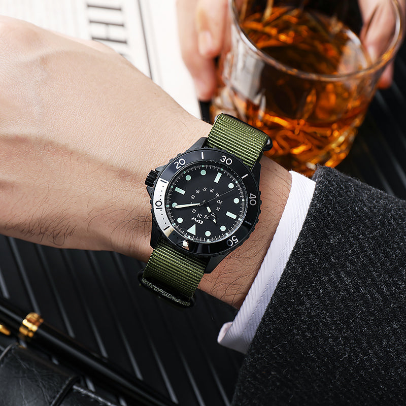 TPW K5013 black dial watch with green nylon strap worn with a dark coat