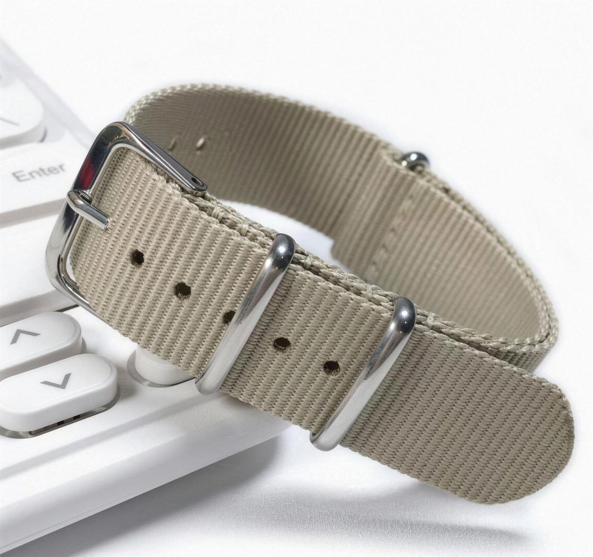 Khaki woven nylon pass-through watch strap with brushed steel keepers and pin buckle
