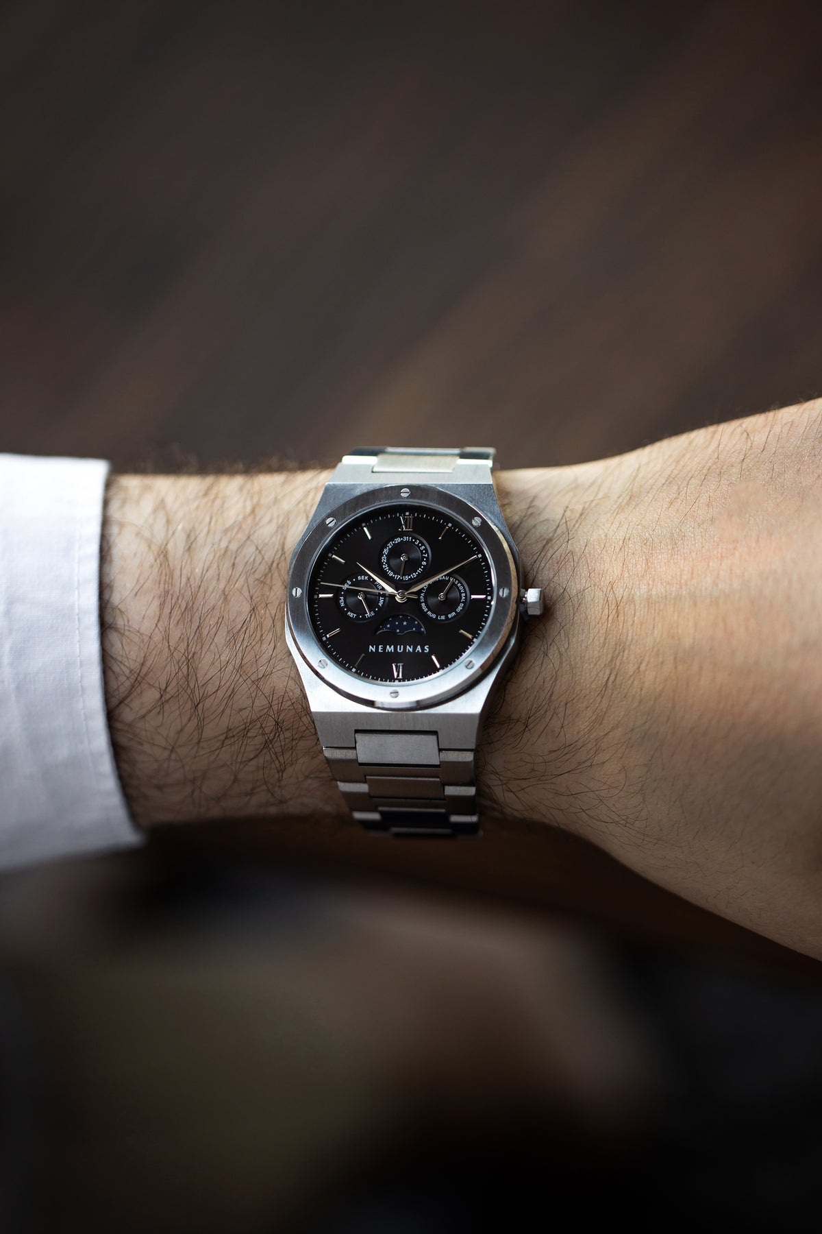 NEMUNAS Perkunas black and silver watch on wrist