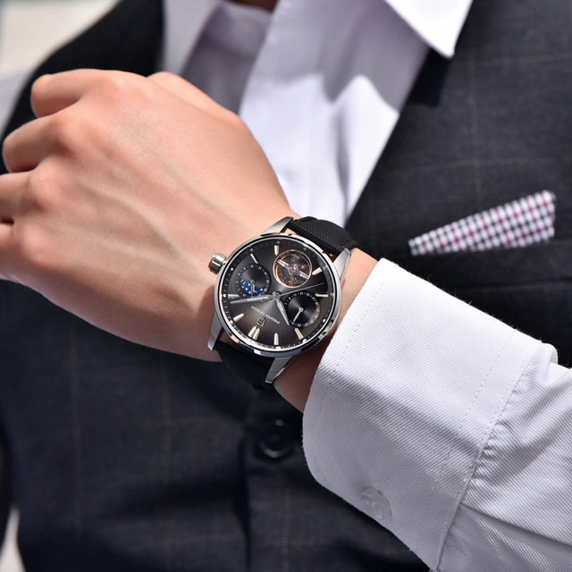Pagani Design YS021 Silver Black automatic watch worn with a suit cuff