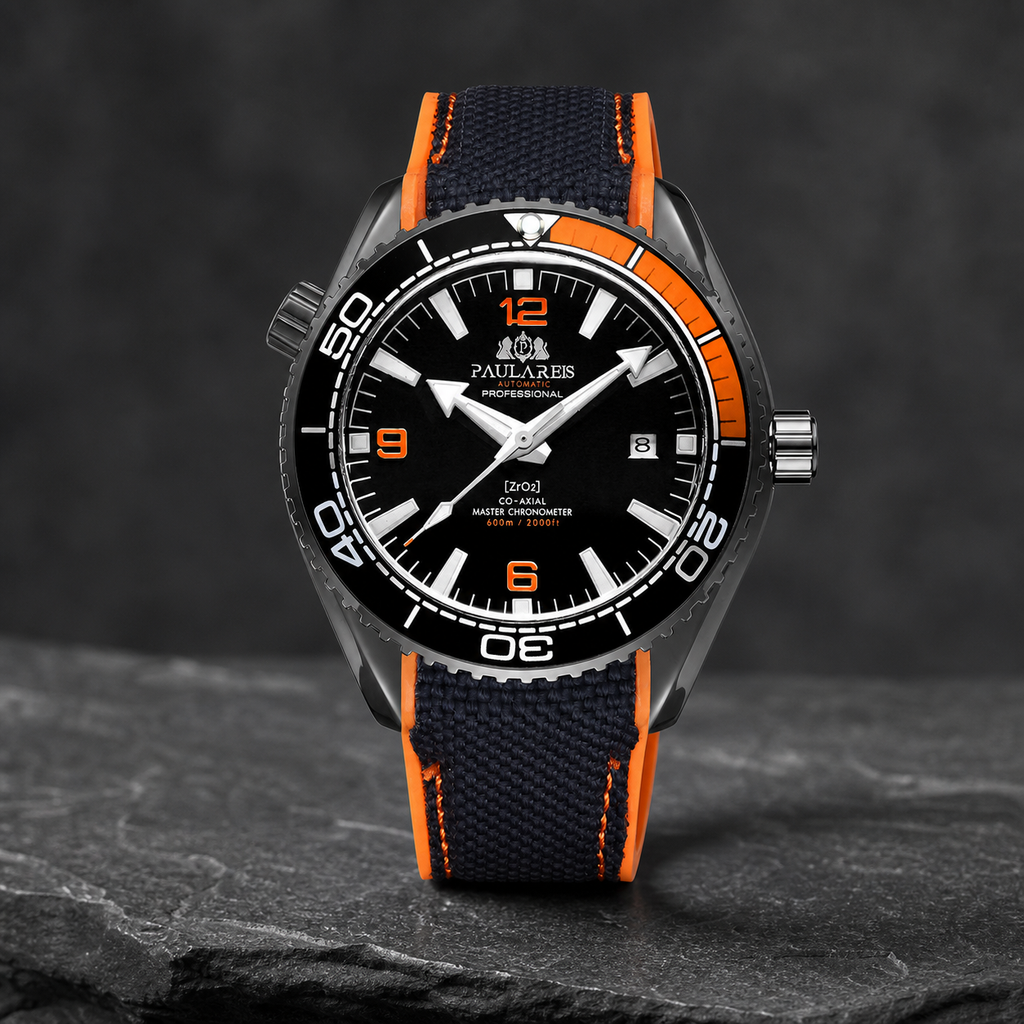 Paulareis black and orange sport automatic watch displayed on stone
