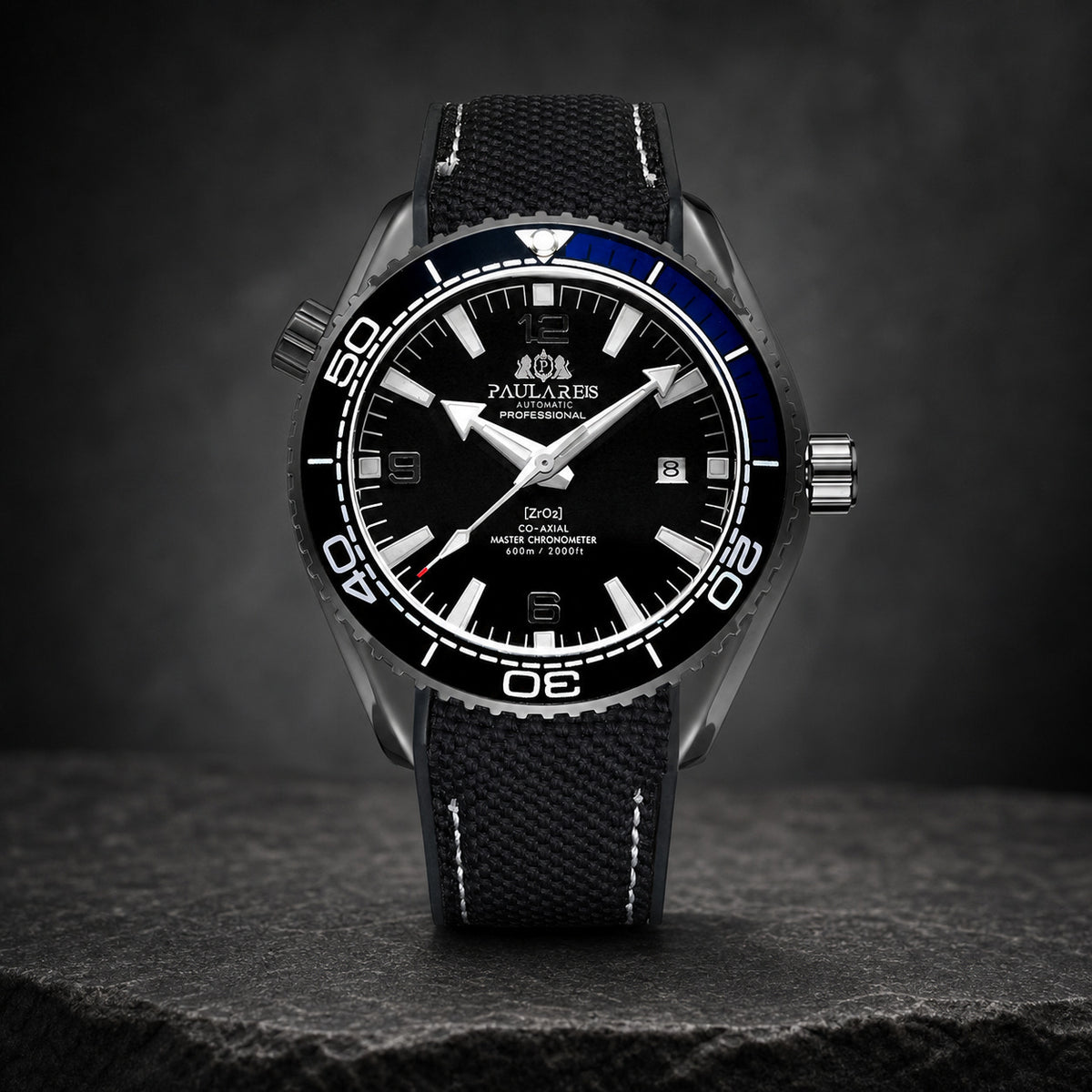 Paulareis black and blue sport automatic watch displayed on stone