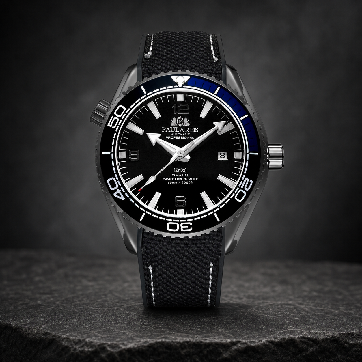 Paulareis black and blue sport automatic watch displayed on stone