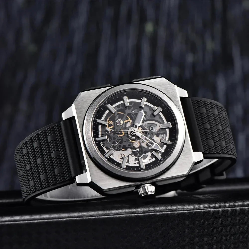 Pagani Design black skeleton automatic on a dark surface, showing the textured black rubber strap