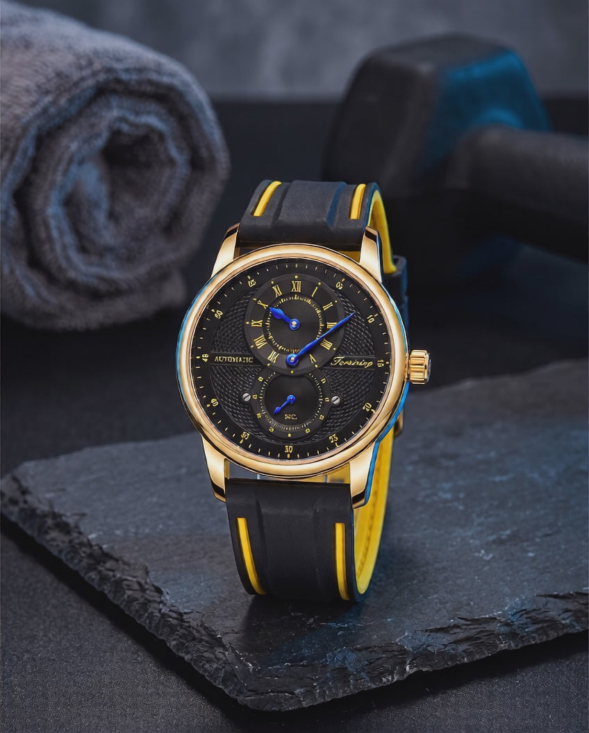 FORSINING automatic sport watch on dark slate with gym towel and dumbbell, slow cinematic orbit