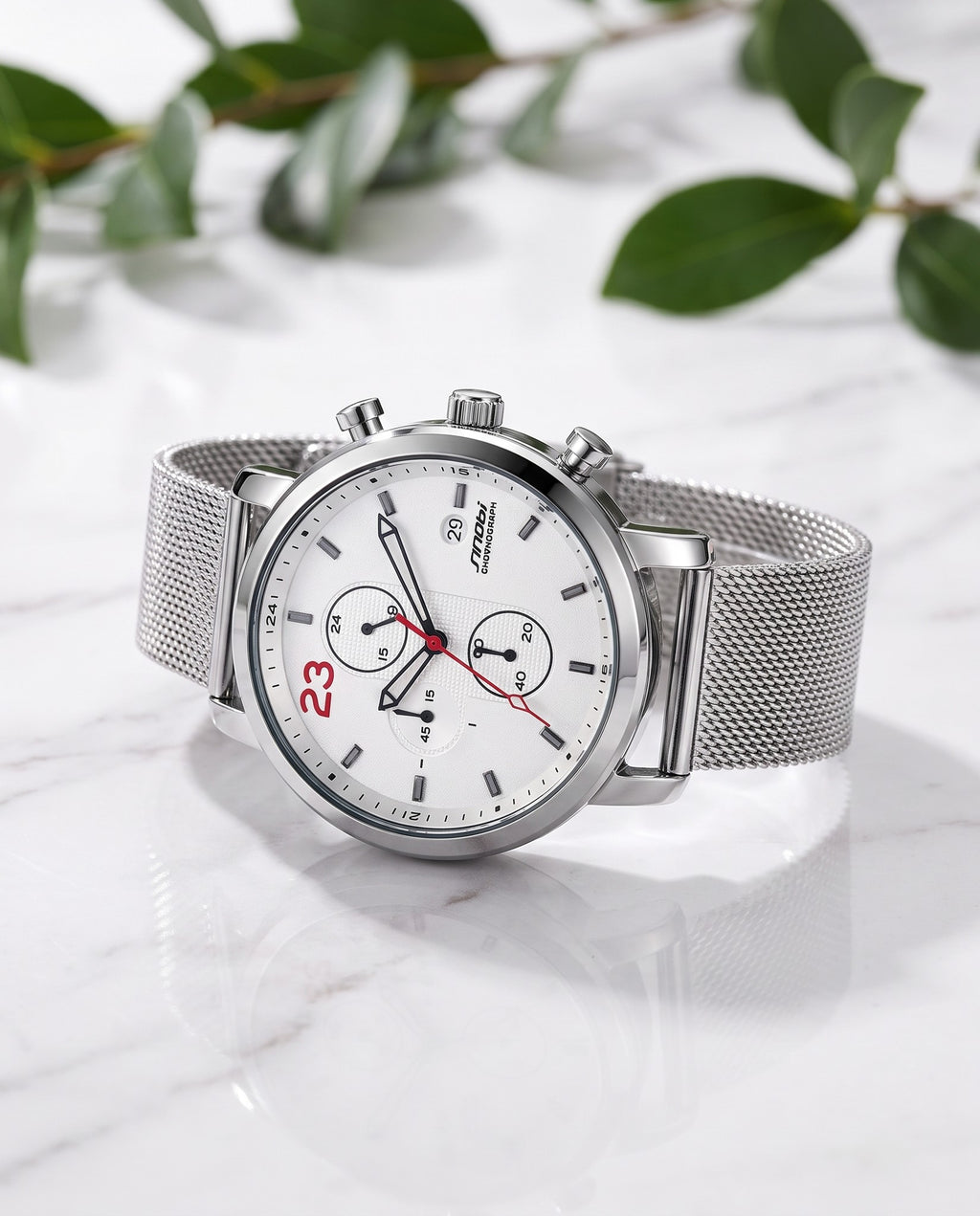 SINOBI S9765G white dial chronograph on steel mesh bracelet resting on white marble