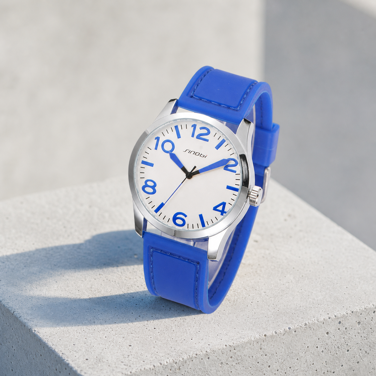 SINOBI 11S9553 G06 Blue quartz watch on sunlit concrete