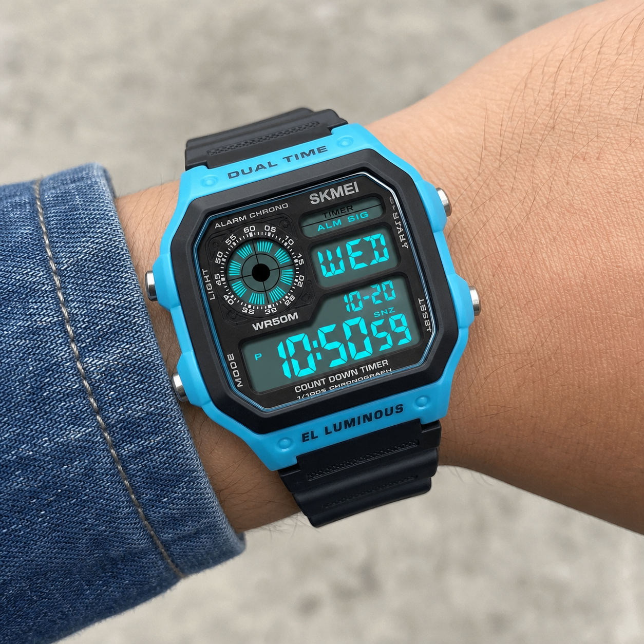 SKMEI 1299 Blue case and black band digital sport watch worn on wrist