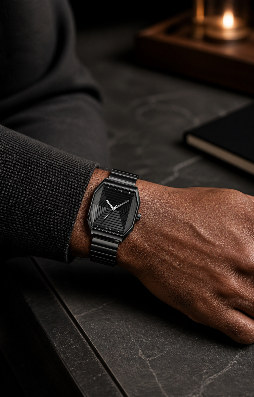 SKMEI 9393 black watch worn at a modern desk