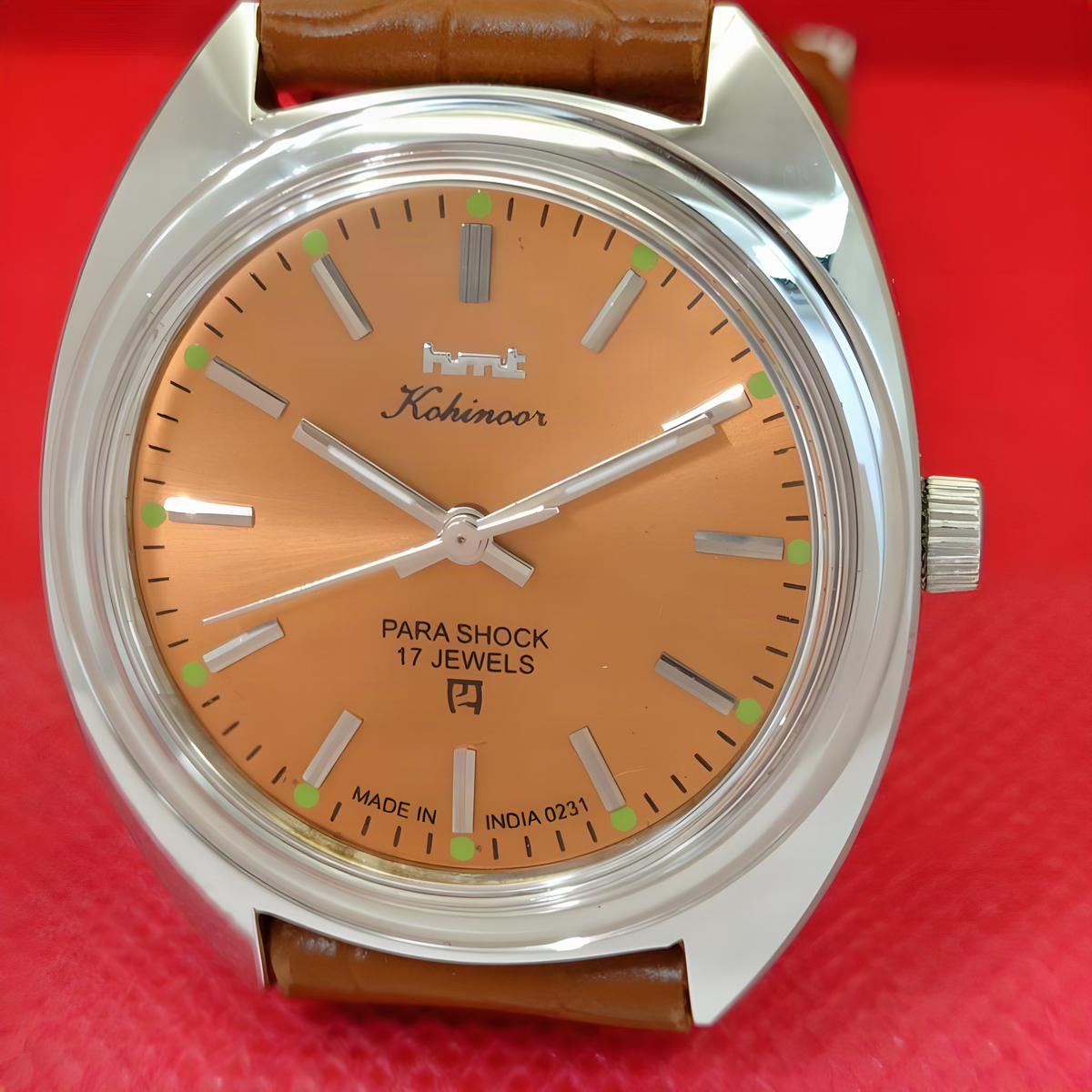 Vintage HMT Kohinoor orange dial close view