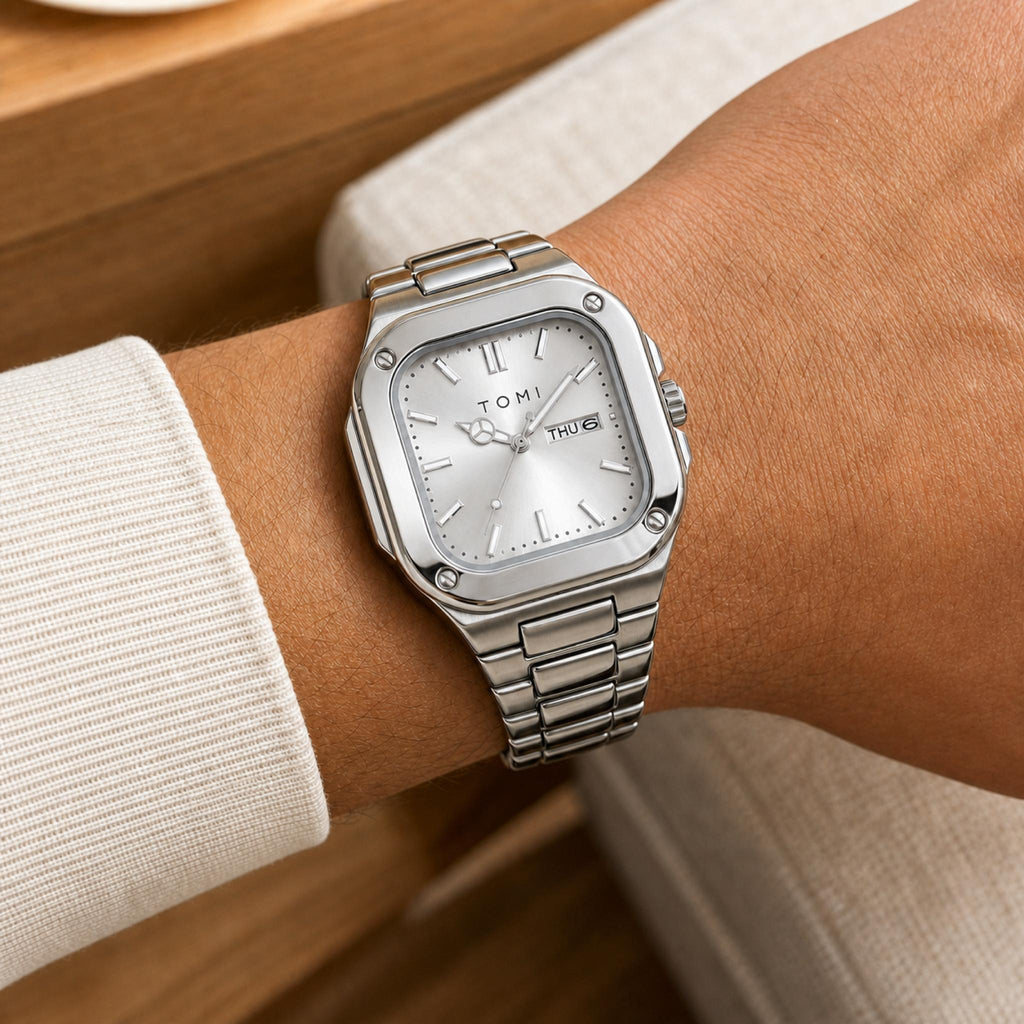 TOMI T306 silver square steel quartz watch with silver dial worn on wrist
