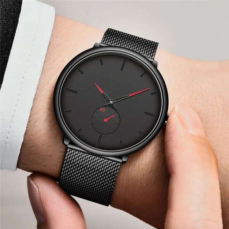 WINDOWSTIME mesh watch worn on wrist, red accents