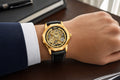 WINNER WRG8249 M3G1 Gold Gold automatic watch in a business lifestyle setting