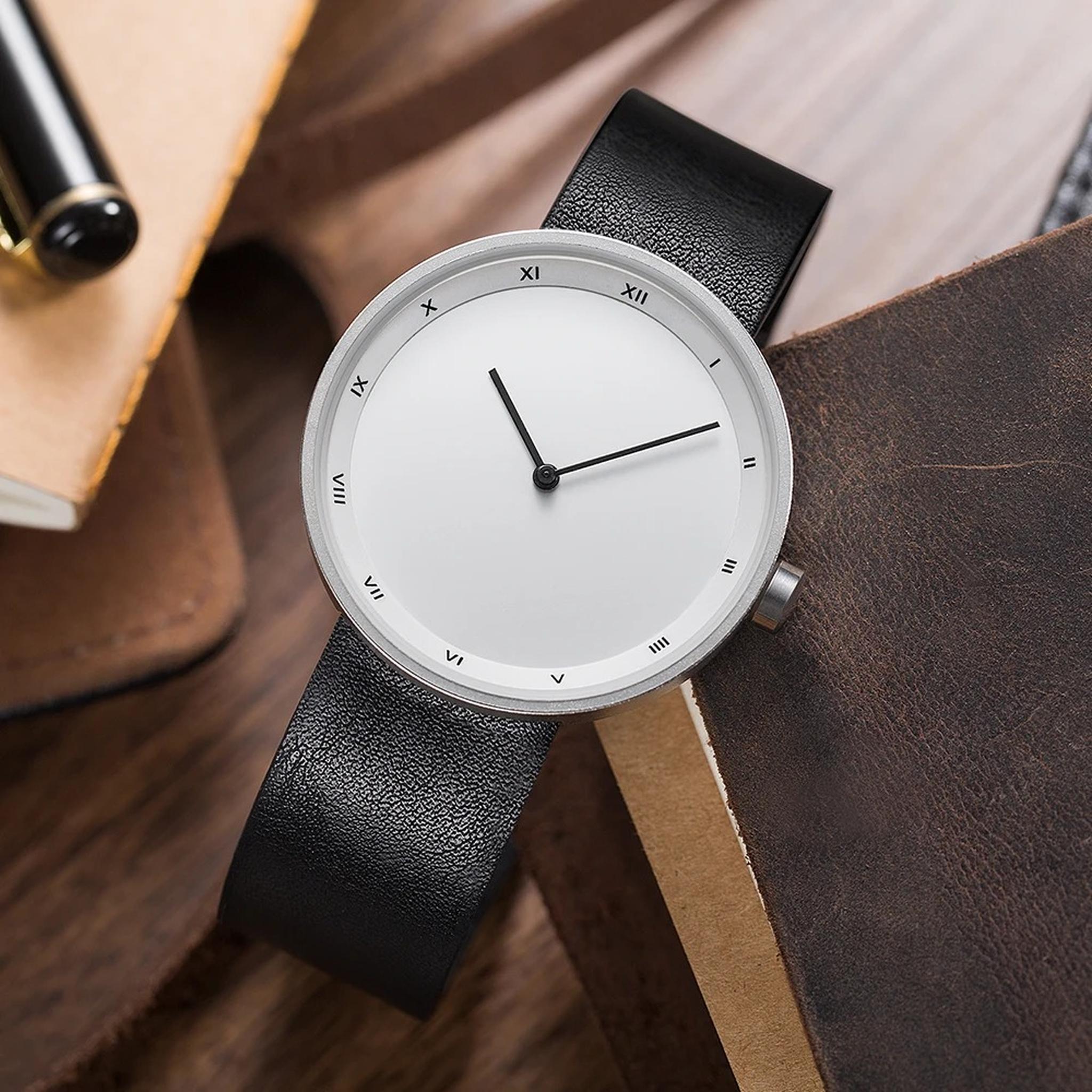 YAZOLE minimalist watch with white dial and black strap